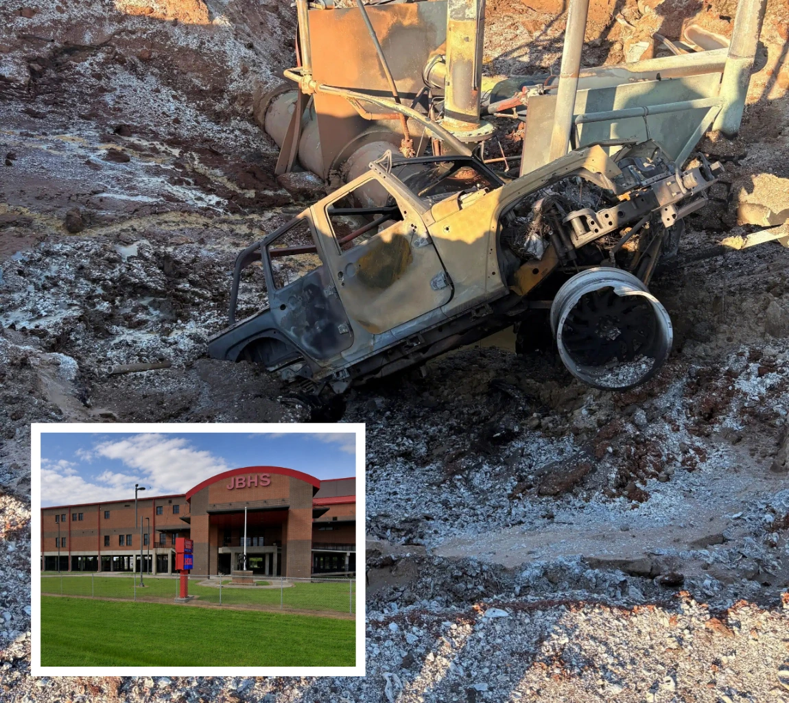 A school building beside a gas-pipeline right-of-way